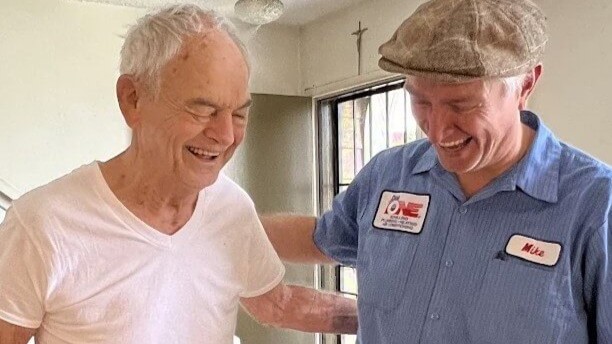 Dial ONE Schilling technician smiling with a senior customer.