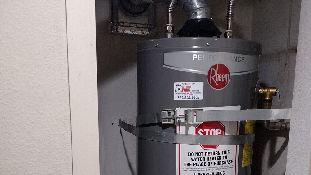 Gas water heater installed with seismic straps.