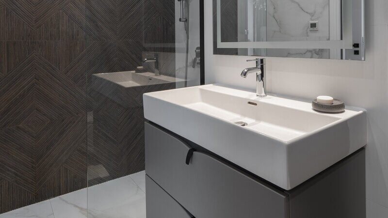 New bathroom sink installation with modern vanity in Lakewood, CA